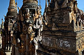 Elaborate figures carved in stucco decorate the ancient stupas, Kakku Buddhist Ruins. Shan State in Myanmar (Burma). 
